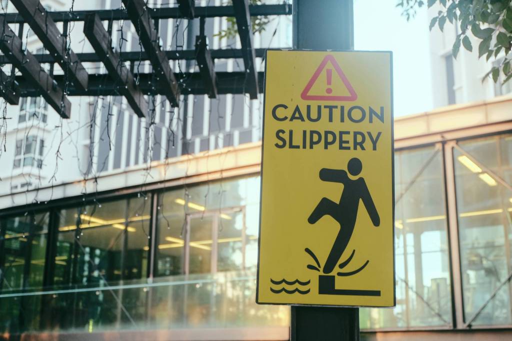 bigstock-Signage-Read--Caution-Slipper